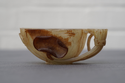 A Chinese lotus-shaped russet jade libation cup, 18/19th C.